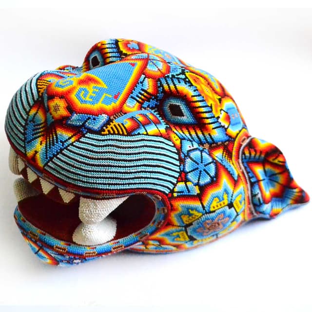 Special jaguar head covered with microchaquira, is an impressive piece with a unique design, made by artisans of the Wixarika community.